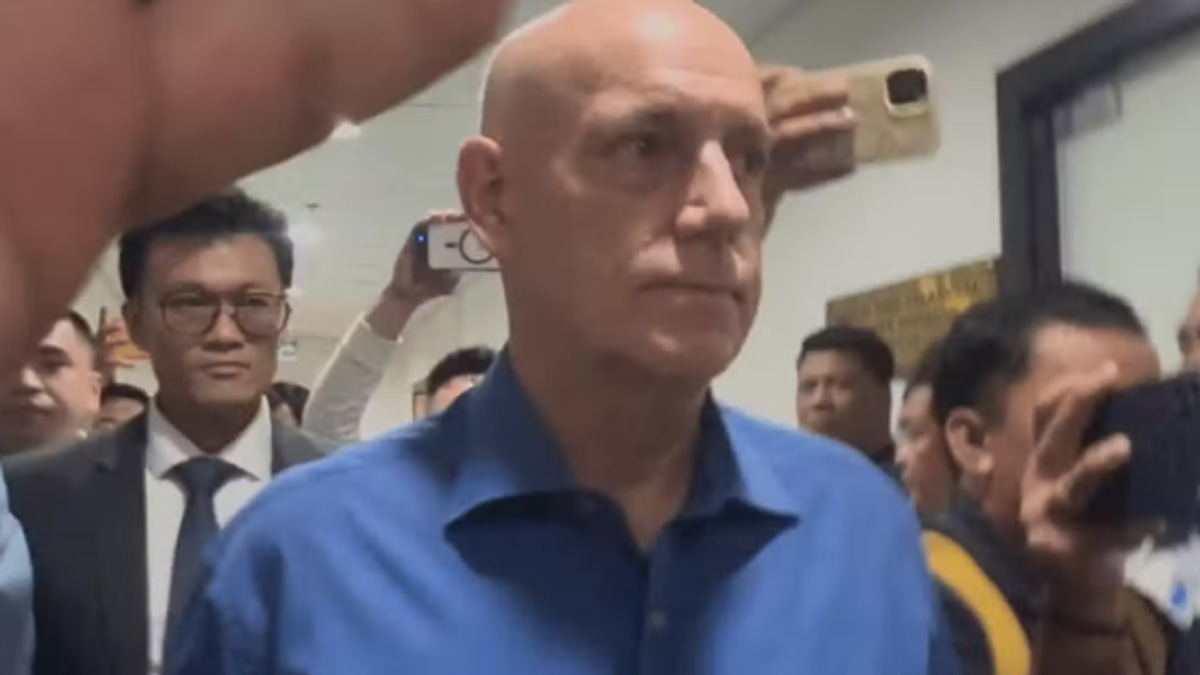 Former Ateneo basketball coach appears before Philippine investigators in student drowning probe