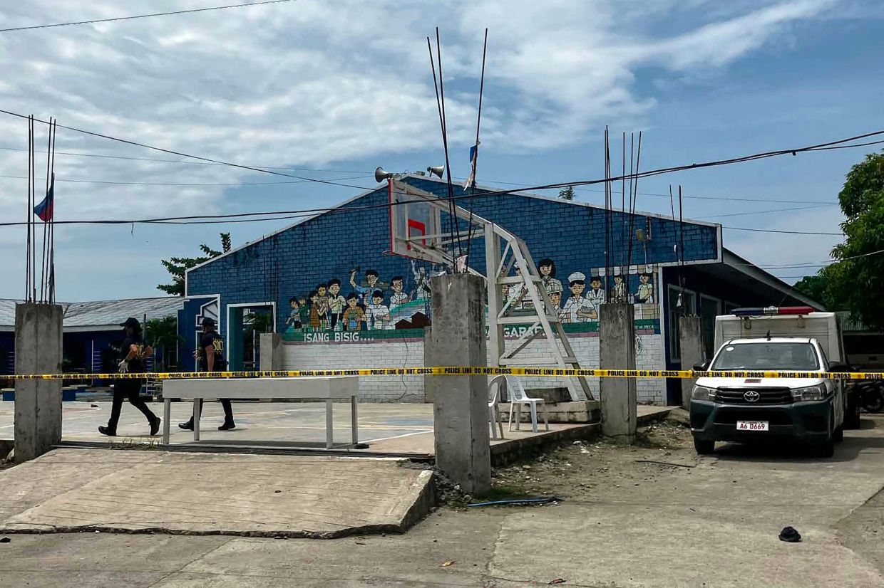 Two teenage students arrested after shooting rampage at Philippine high school leaves three dead