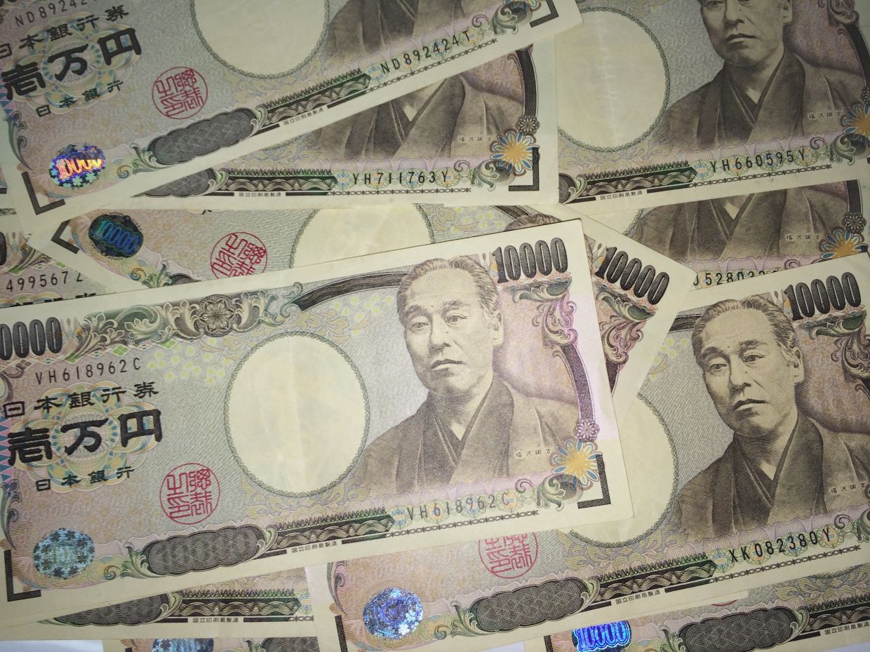 Japanese yen languishes near 40-year low despite intervention and rate rise
