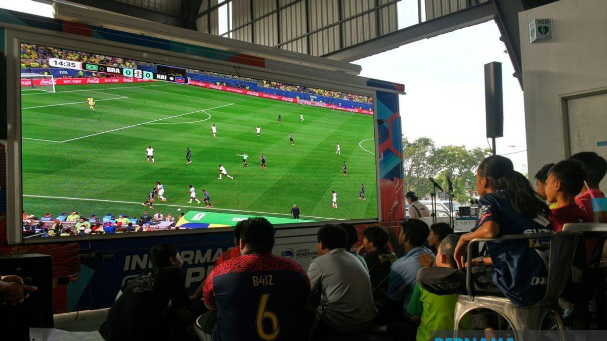 Free World Cup Broadcasts Ease Cost Burden for Malaysian Traders and Diners