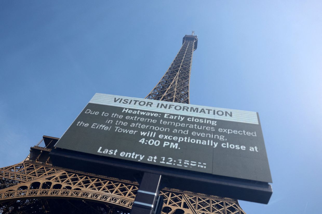Paris heatwave forces landmark closures, leaving tourists frustrated
