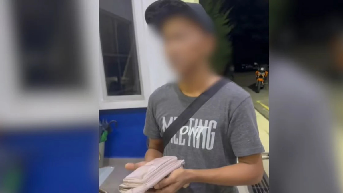 Delivery Rider Detained Over RM10,000 Cash Theft from Lost Wallet
